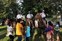 Police equestrian team enjoys a visit from an enthusiastic crowd. Courtesy Barb Ziegler.
